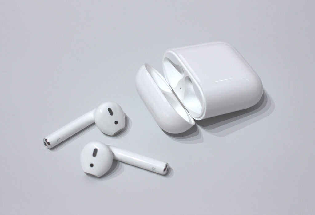 AirPods 5 add open-ear ANC for about AED 539. Score 7.4/10 for creator commutes. When sealed Pros still win on flights.